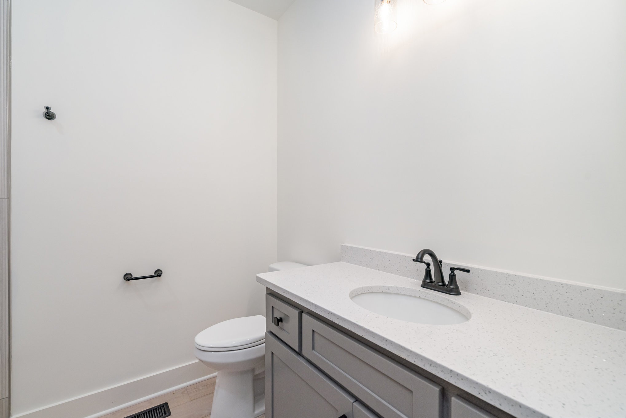 115 Crenshaw Road Hartsville, TN 37074 - Photo 17 of 40 a bathroom with a sink a toilet and mirror