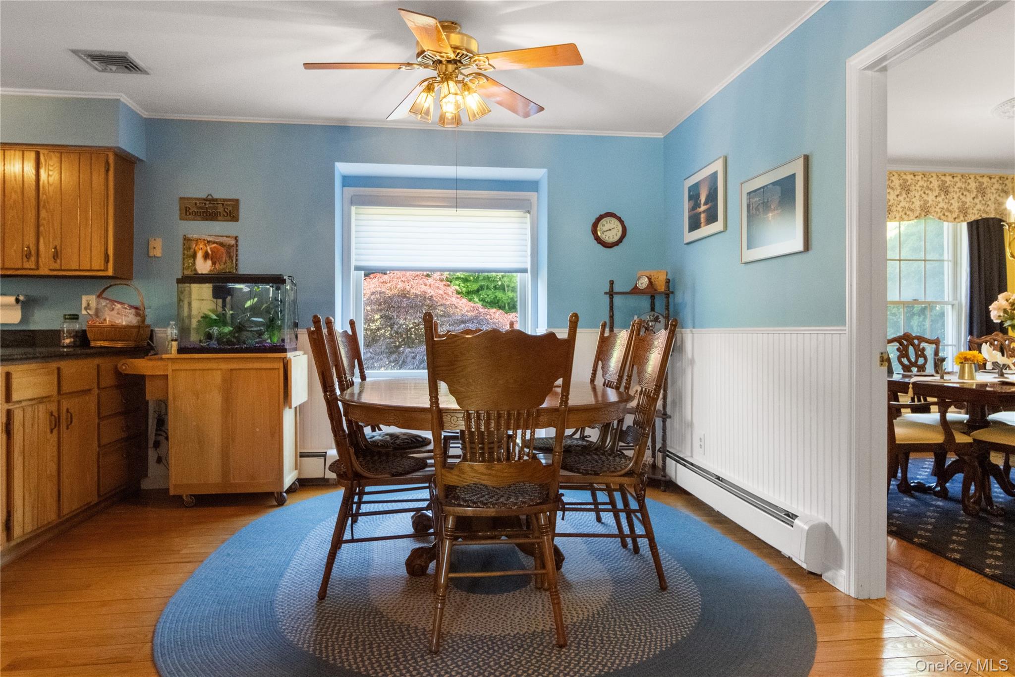 214 West Mombasha Road Monroe, NY 10950 - Photo 14 of 43 a view of a dining room with furniture window and wooden floor