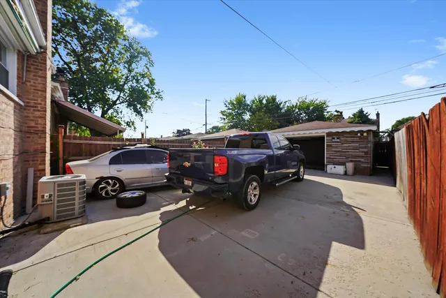 a view of a porch with furniture and a fire pit