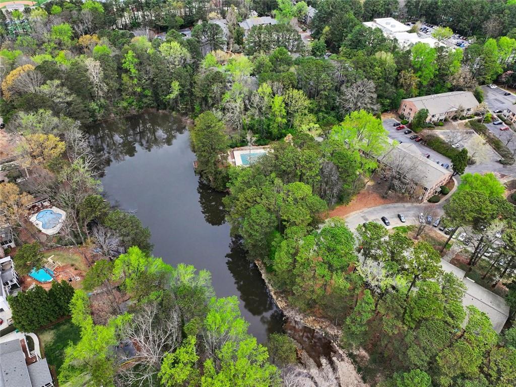 3650 Ashford Dunwoody Road Northeast, Unit 904 Atlanta, GA 30319 - Photo 31 of 33 a view of a lake with a building
