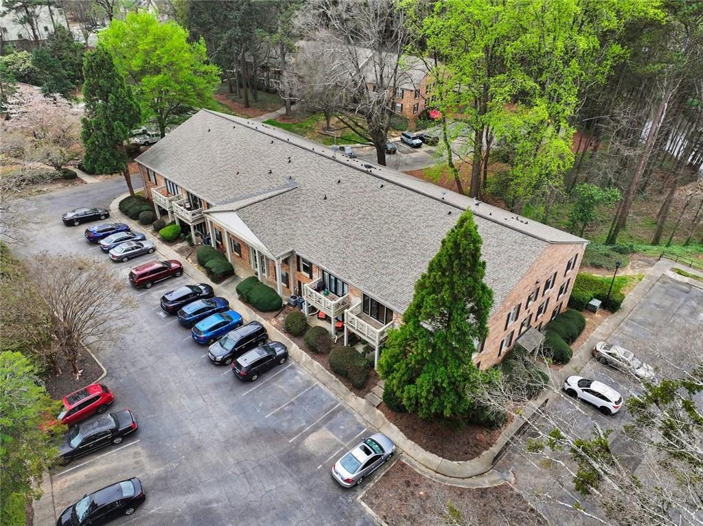 3650 Ashford Dunwoody Road Northeast, Unit 904 Atlanta, GA 30319 - Photo 32 of 33 an aerial view of a house with garden space and street view