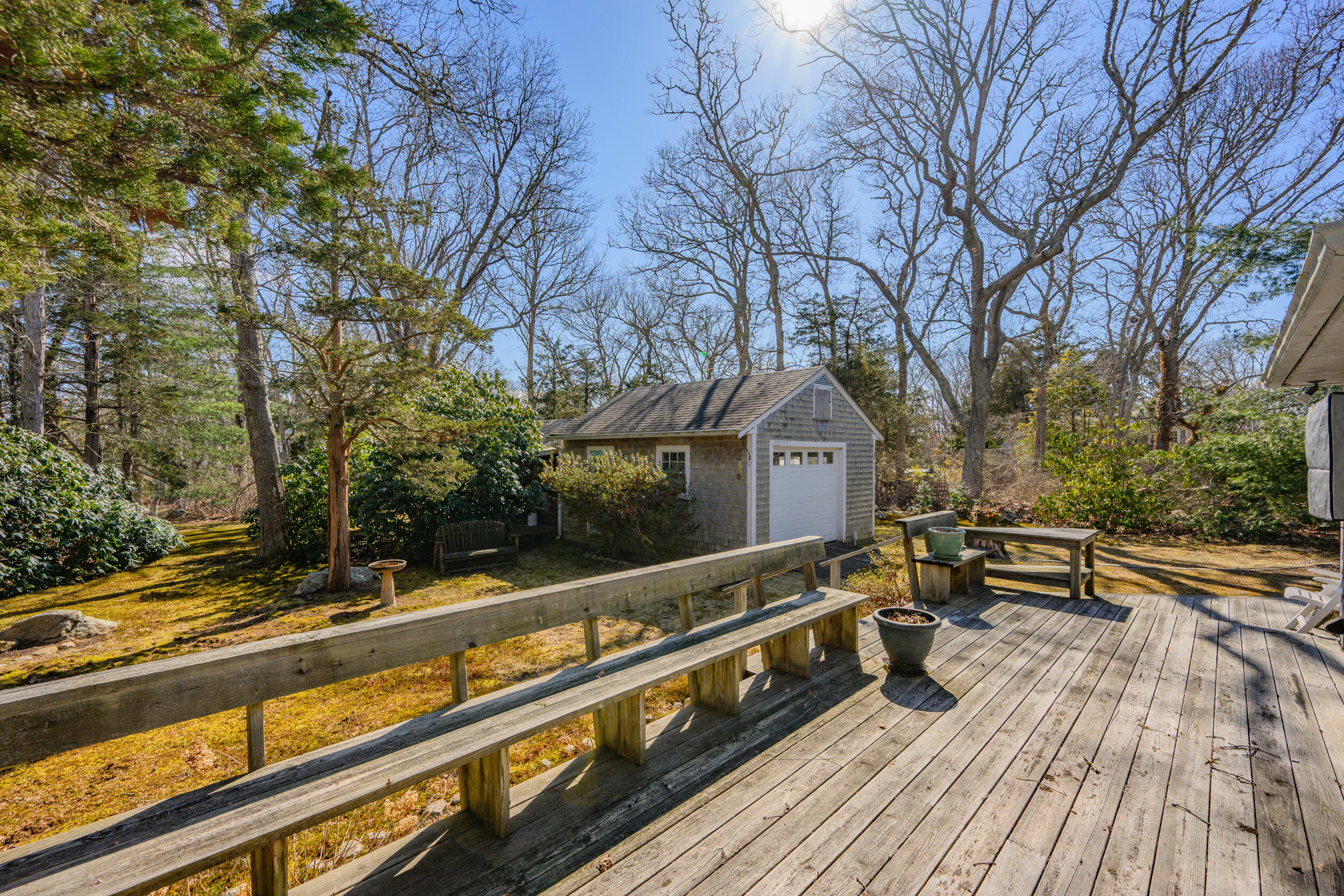 13 Hidden Village Road West Falmouth, MA 02540 - Photo 11 of 31 a view of a roof deck with wooden floor and fence