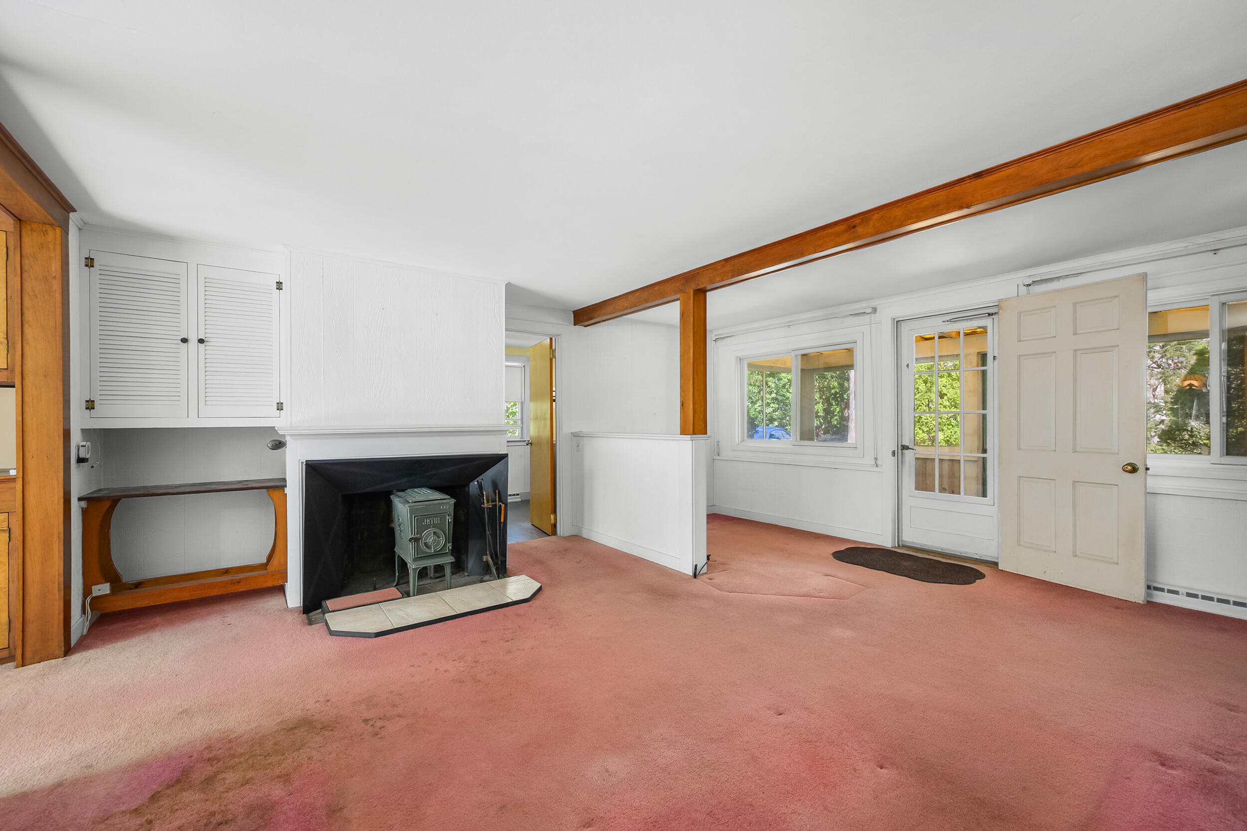 13 Hidden Village Road West Falmouth, MA 02540 - Photo 15 of 31 a view of a livingroom with an empty room and fire place
