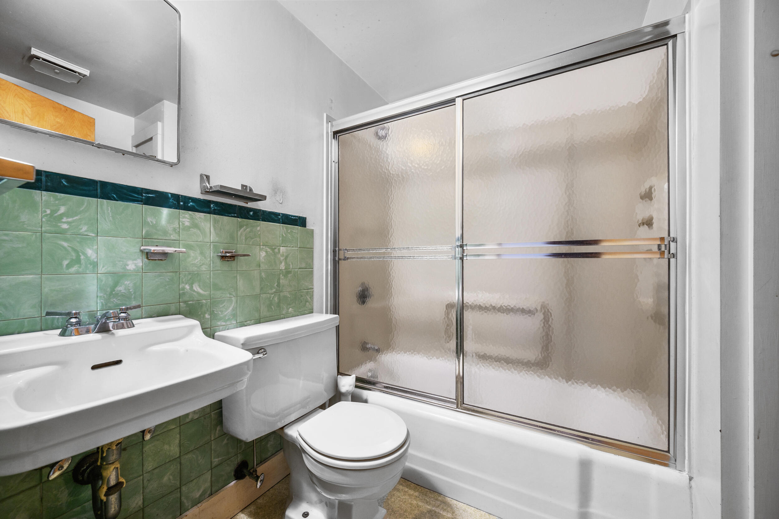 13 Hidden Village Road West Falmouth, MA 02540 - Photo 25 of 31 a bathroom with a sink toilet and shower