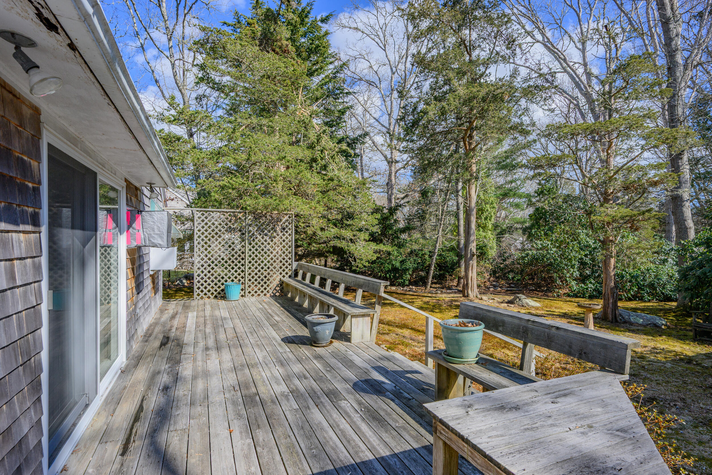 13 Hidden Village Road West Falmouth, MA 02540 - Photo 10 of 31 a view of a deck with wooden floor and outdoor seating