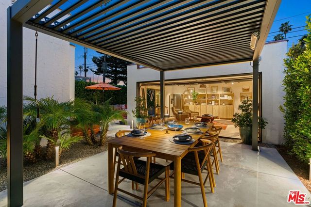 a outdoor space with patio lots of furniture