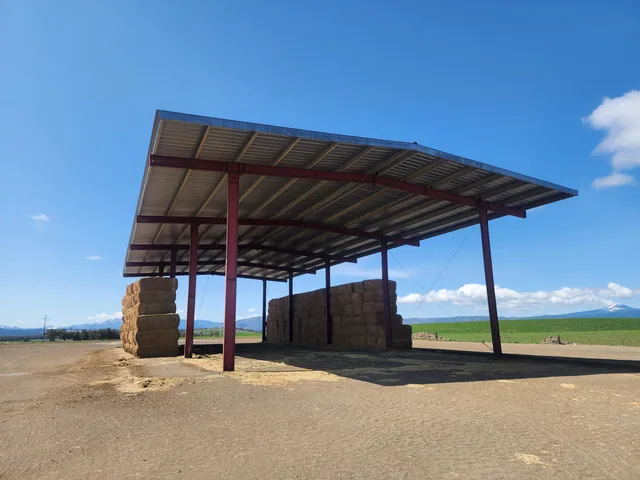 a view of a field with an outdoor space