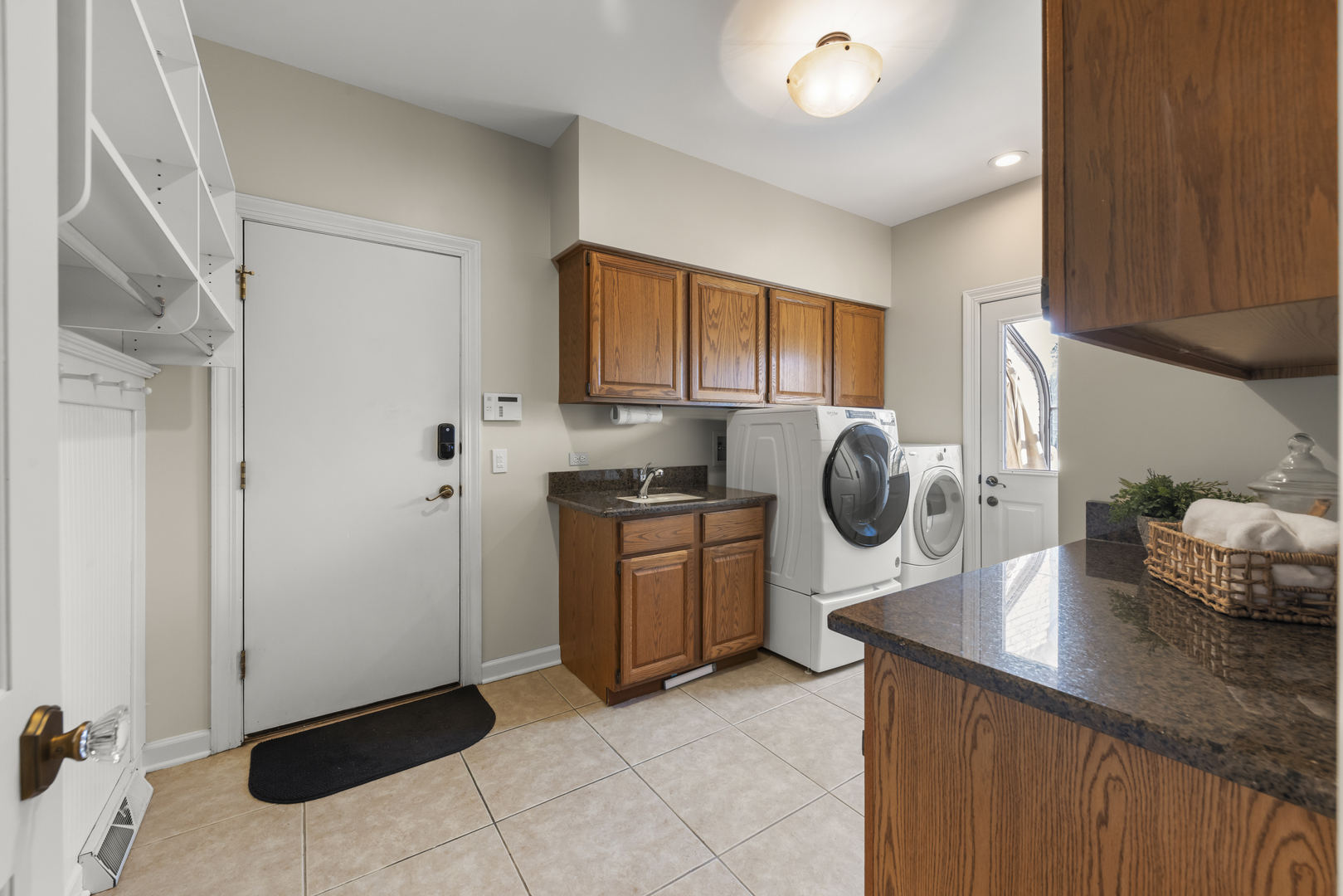 1S151 Winfield Road Wheaton, IL 60189 - Photo 23 of 73 a kitchen with a sink cabinets and utility