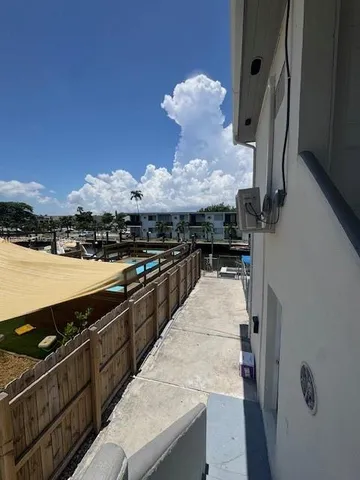 a kitchen with stainless steel appliances granite countertop a stove and a refrigerator