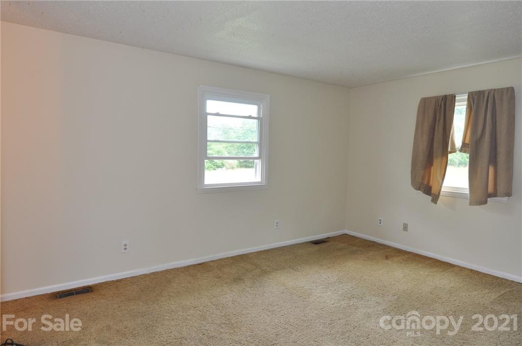 801 Charity Road, Unit 6 Chester, SC 29706 - Photo 14 of 26 an empty room with a window