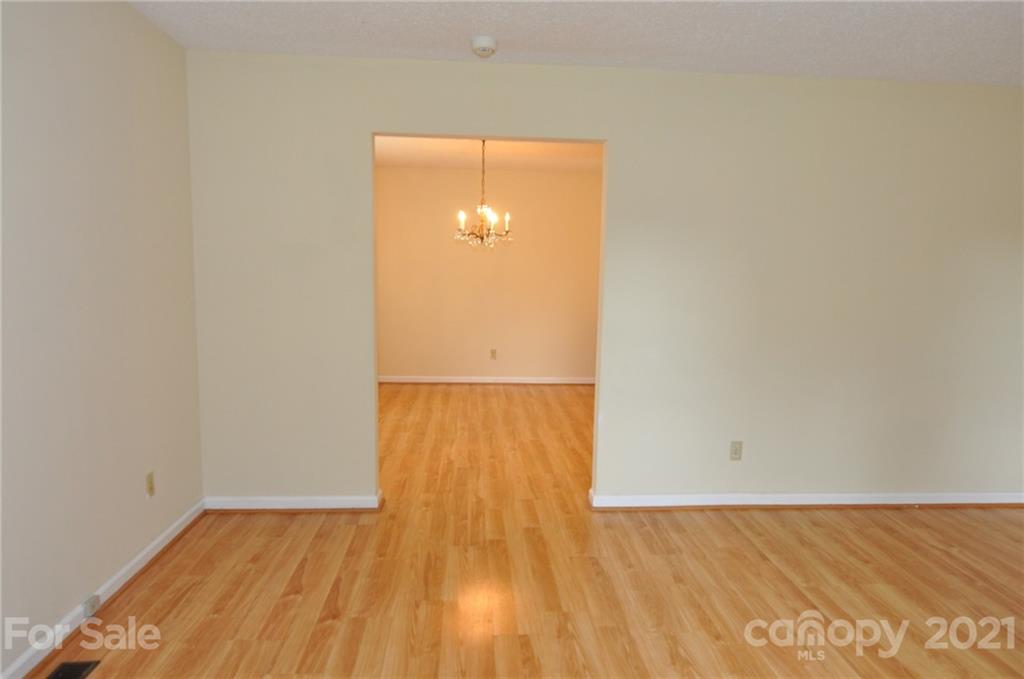801 Charity Road, Unit 6 Chester, SC 29706 - Photo 5 of 26 a view of a room with wooden floor