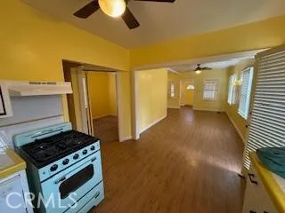 a kitchen with a stove and a refrigerator