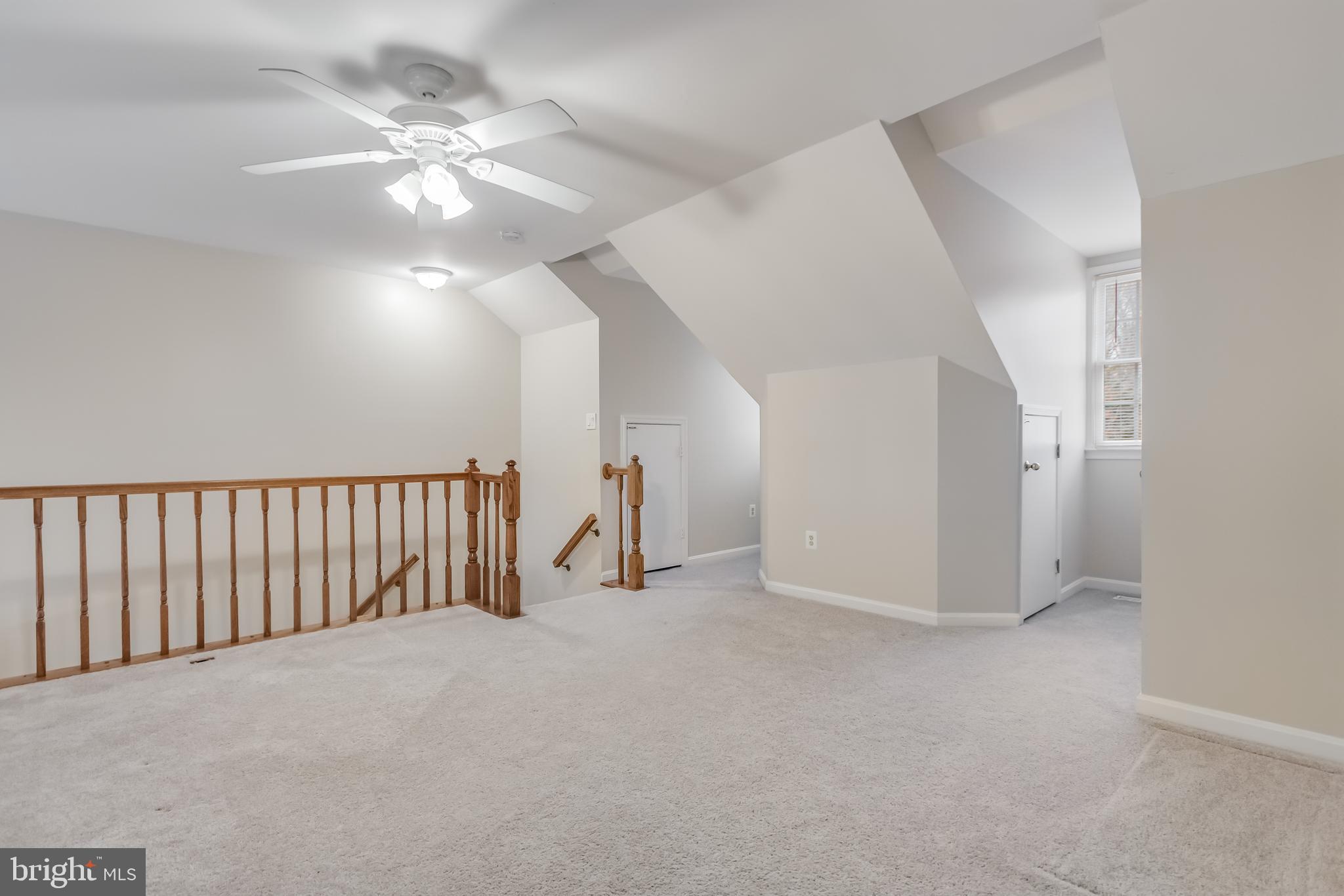 8735 Stone Hill Place Springfield, VA 22153 - Photo 35 of 51 a view of a livingroom with a staircase