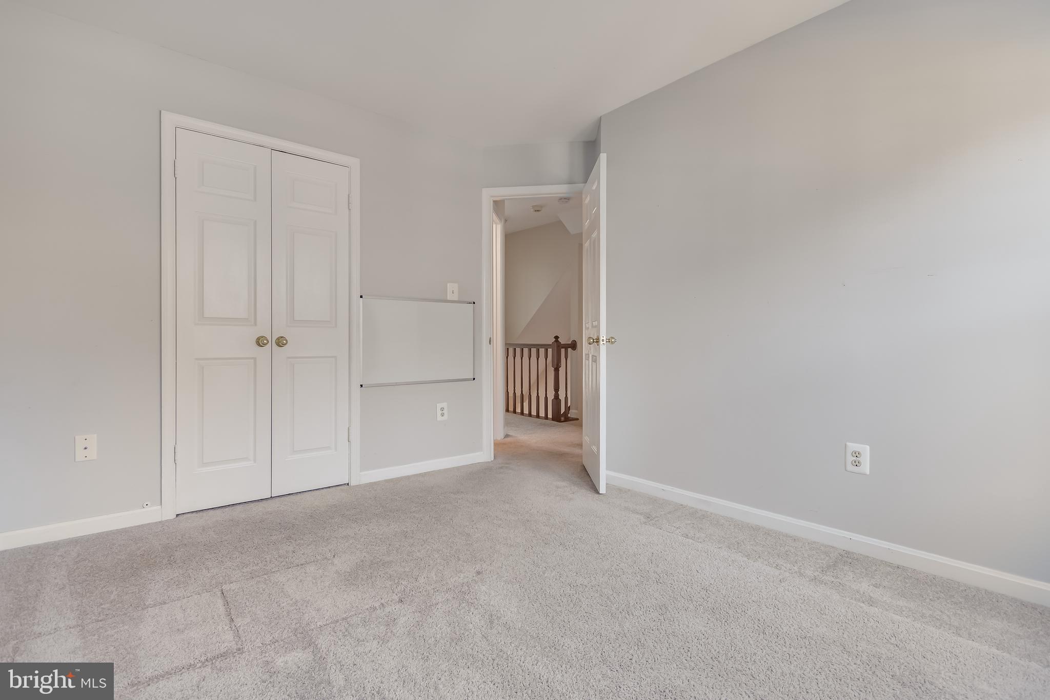 8735 Stone Hill Place Springfield, VA 22153 - Photo 38 of 51 a view of an empty room and closet area