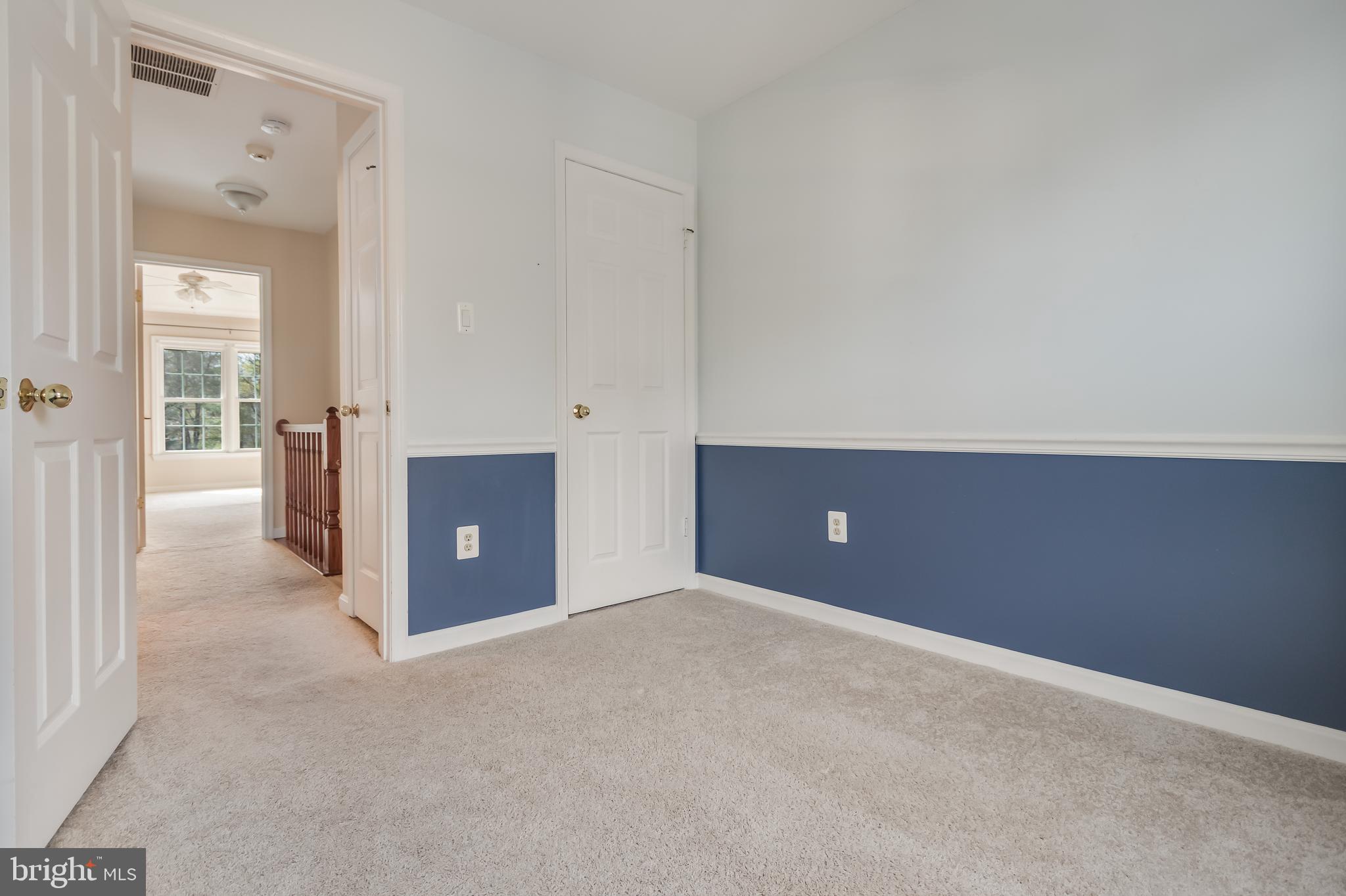 8735 Stone Hill Place Springfield, VA 22153 - Photo 39 of 51 wooden floor and cabinet in a room