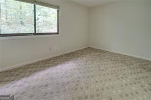 3782 Mulkey Circle Southwest, Unit 18 Austell, GA 30106 - Photo 13 of 54 an empty room with a window
