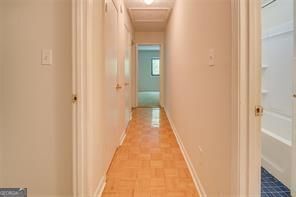 3782 Mulkey Circle Southwest, Unit 18 Austell, GA 30106 - Photo 16 of 54 a view of a hallway with wooden floor