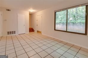 3782 Mulkey Circle Southwest, Unit 18 Austell, GA 30106 - Photo 23 of 54 a view of an empty room and window