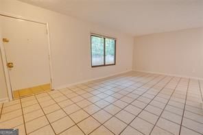 3782 Mulkey Circle Southwest, Unit 18 Austell, GA 30106 - Photo 25 of 54 a view of an empty room and window