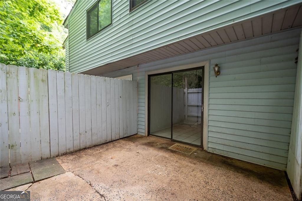 3782 Mulkey Circle Southwest, Unit 18 Austell, GA 30106 - Photo 30 of 54 a view of a backyard
