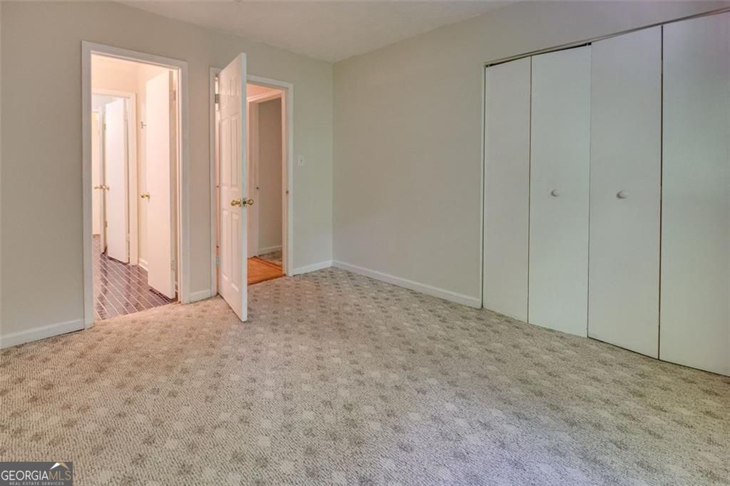 3782 Mulkey Circle Southwest, Unit 18 Austell, GA 30106 - Photo 37 of 54 a view of an empty room