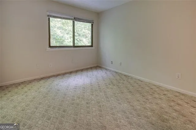 an empty room with a window