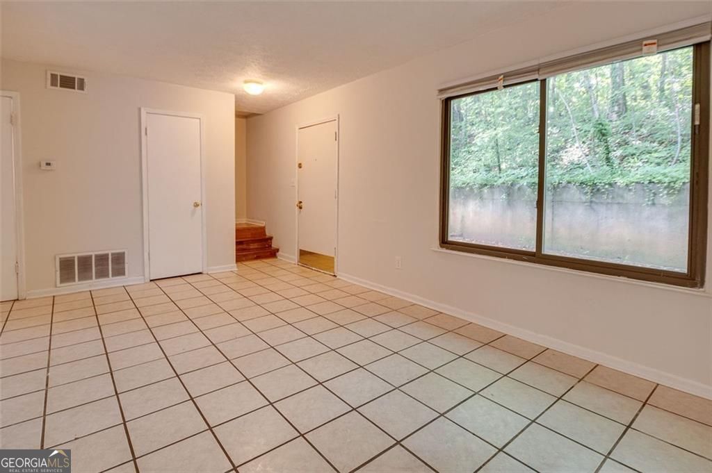 3782 Mulkey Circle Southwest, Unit 18 Austell, GA 30106 - Photo 50 of 54 a view of an empty room and window