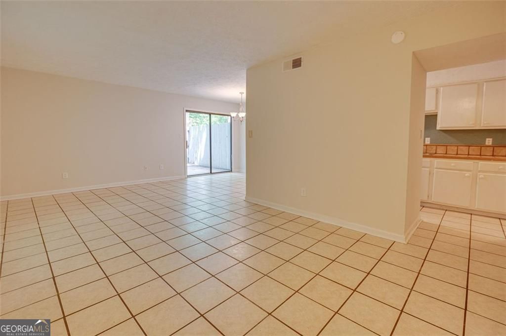 3782 Mulkey Circle Southwest, Unit 18 Austell, GA 30106 - Photo 51 of 54 a view of an empty room and window