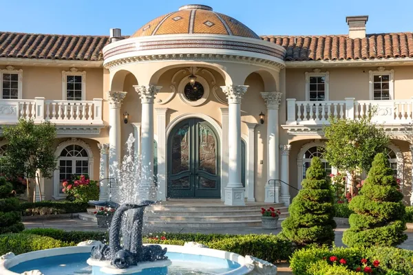 a view of a yard with an ocean view