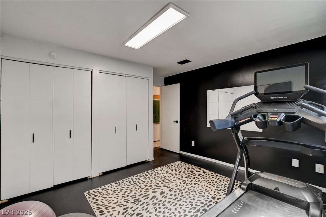 3765 Berkeley Street Logandale, NV 89021 - Photo 62 of 87 This versatile room offers ample storage, perfect for a dedicated exercise space, creative pursuits or bedroom.