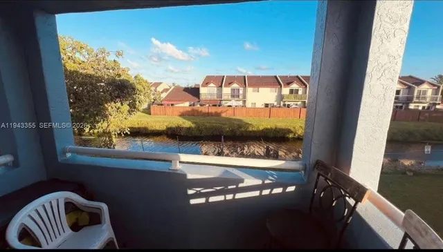 a view of a balcony with an outdoor space