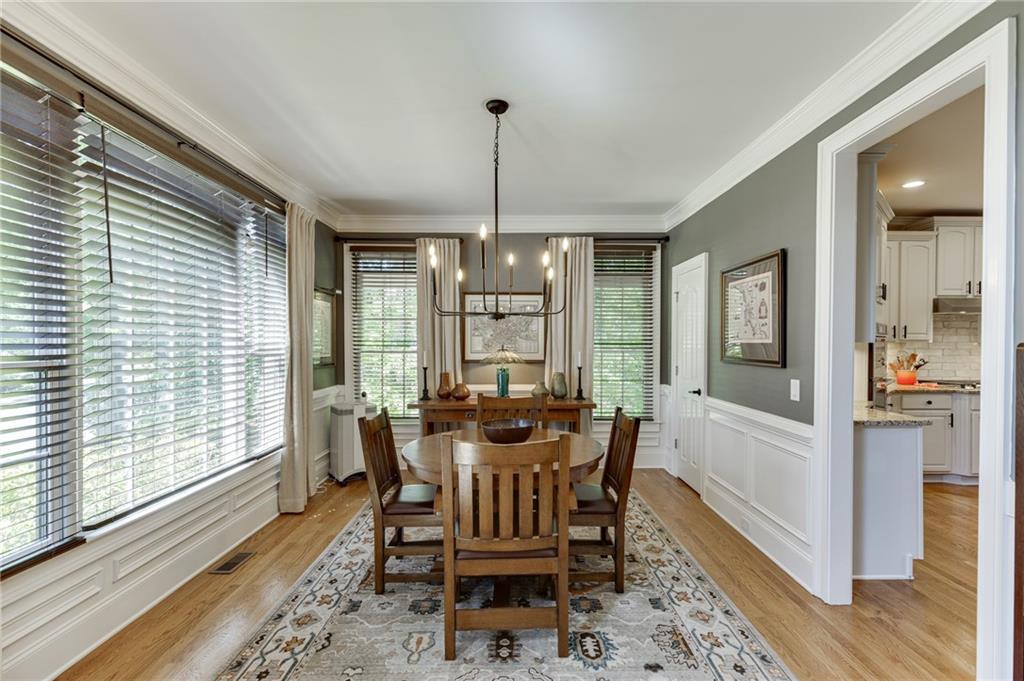 2758 Pathview Drive Dacula, GA 30019 - Photo 9 of 48 a view of a dining room with furniture window and wooden floor
