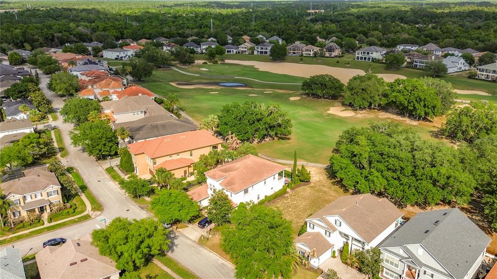 1233 Radiant Street Reunion, FL 34747 - Photo 12 of 18 an aerial view of residential houses with outdoor space and river