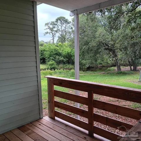 a view of a bench in a yard