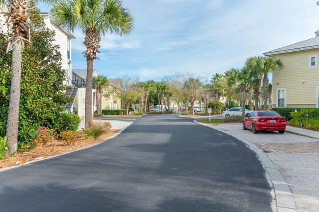 a view of street with parked cars