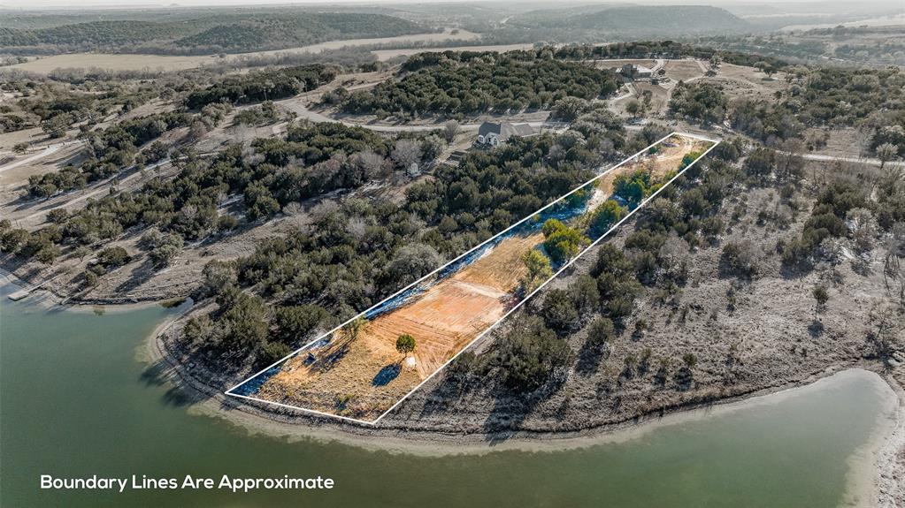 6445 Compass Way Bluff Dale, TX 76433 - Photo 1 of 1 a view of a lake