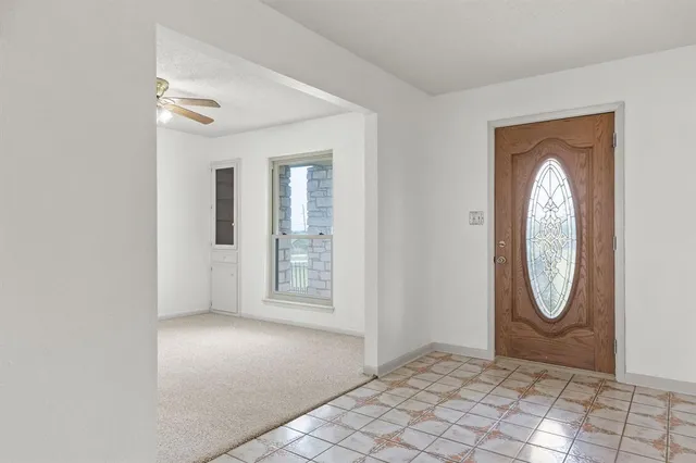 an empty room with mirror