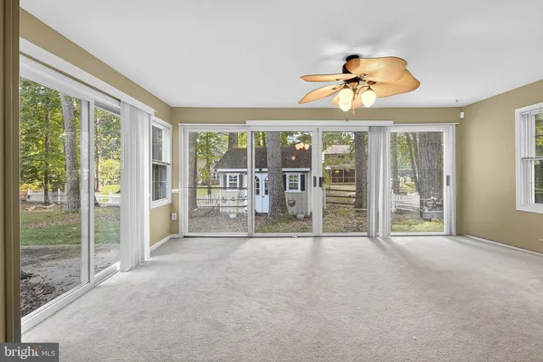 a view of an empty room and window