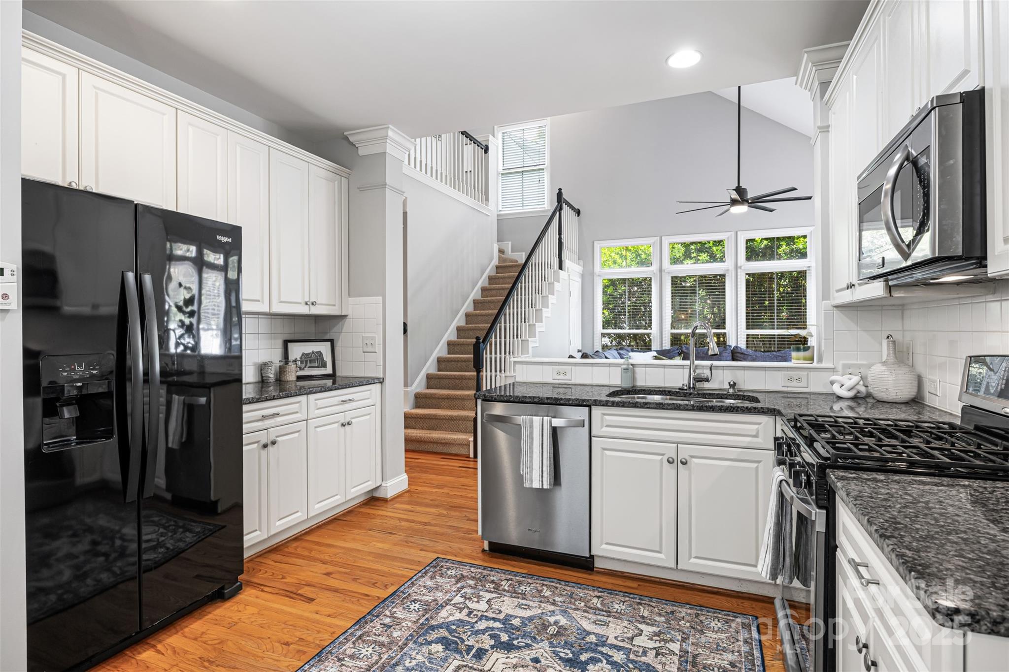 126 Blandina Court Fort Mill, SC 29708 - Photo 12 of 33 a kitchen with stainless steel appliances granite countertop a stove a sink and a refrigerator