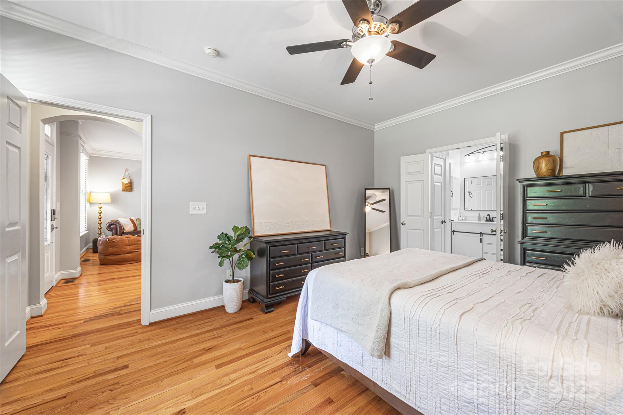 126 Blandina Court Fort Mill, SC 29708 - Photo 15 of 33 a bedroom with a bed and wooden floor