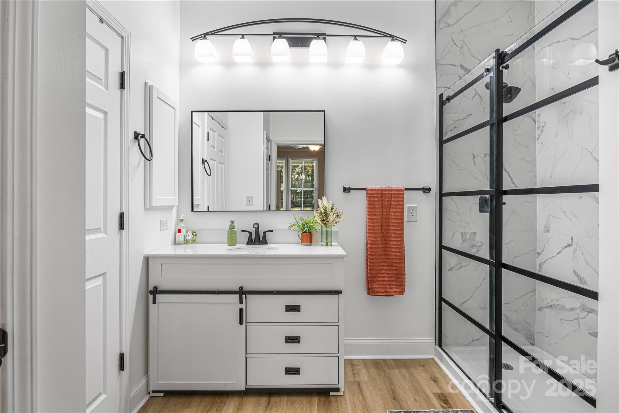126 Blandina Court Fort Mill, SC 29708 - Photo 16 of 33 a bathroom with a sink and mirror