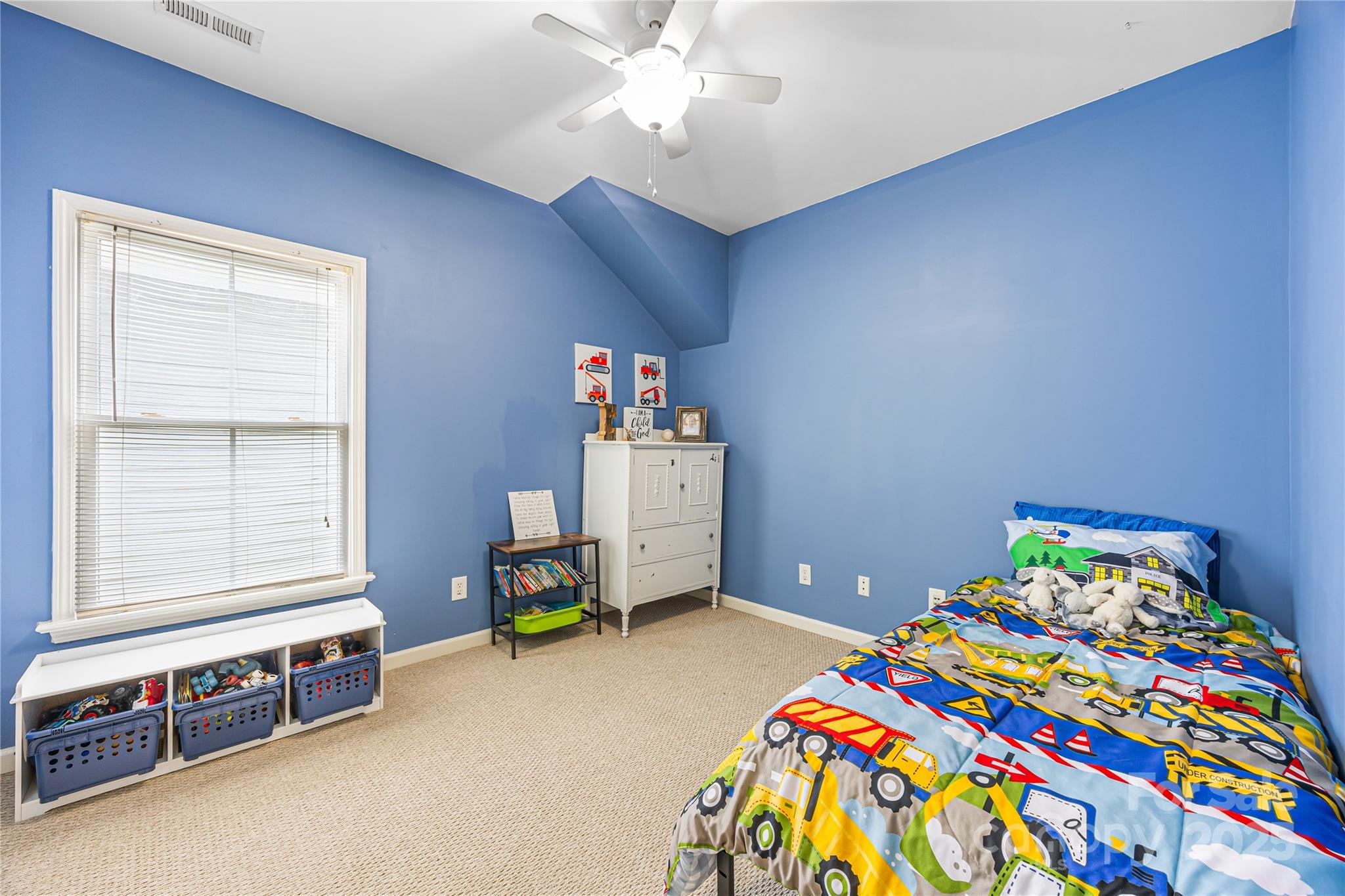 126 Blandina Court Fort Mill, SC 29708 - Photo 18 of 33 a bedroom with a bed and a window