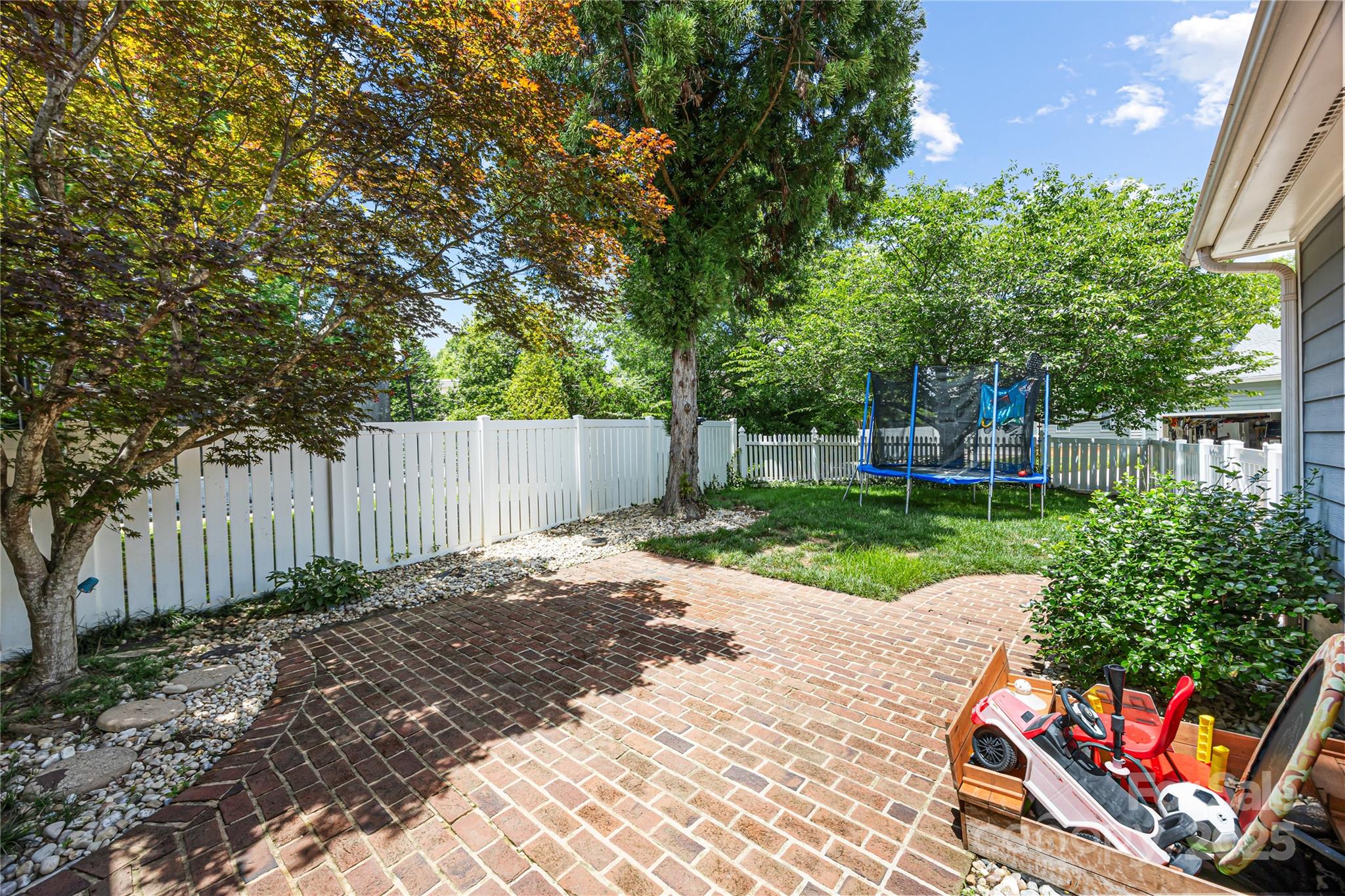 126 Blandina Court Fort Mill, SC 29708 - Photo 22 of 33 a view of a backyard with wooden fence