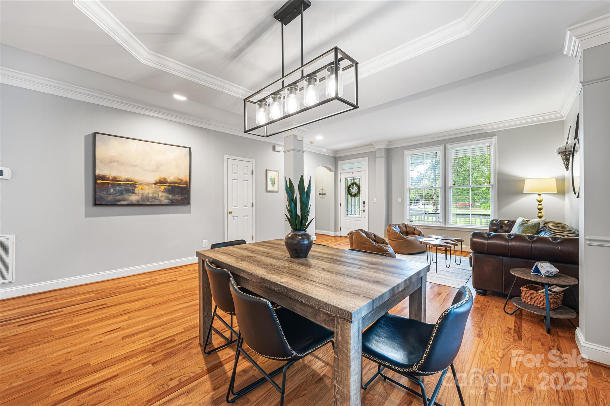 126 Blandina Court Fort Mill, SC 29708 - Photo 3 of 33 a view of a dining room with furniture window and wooden floor