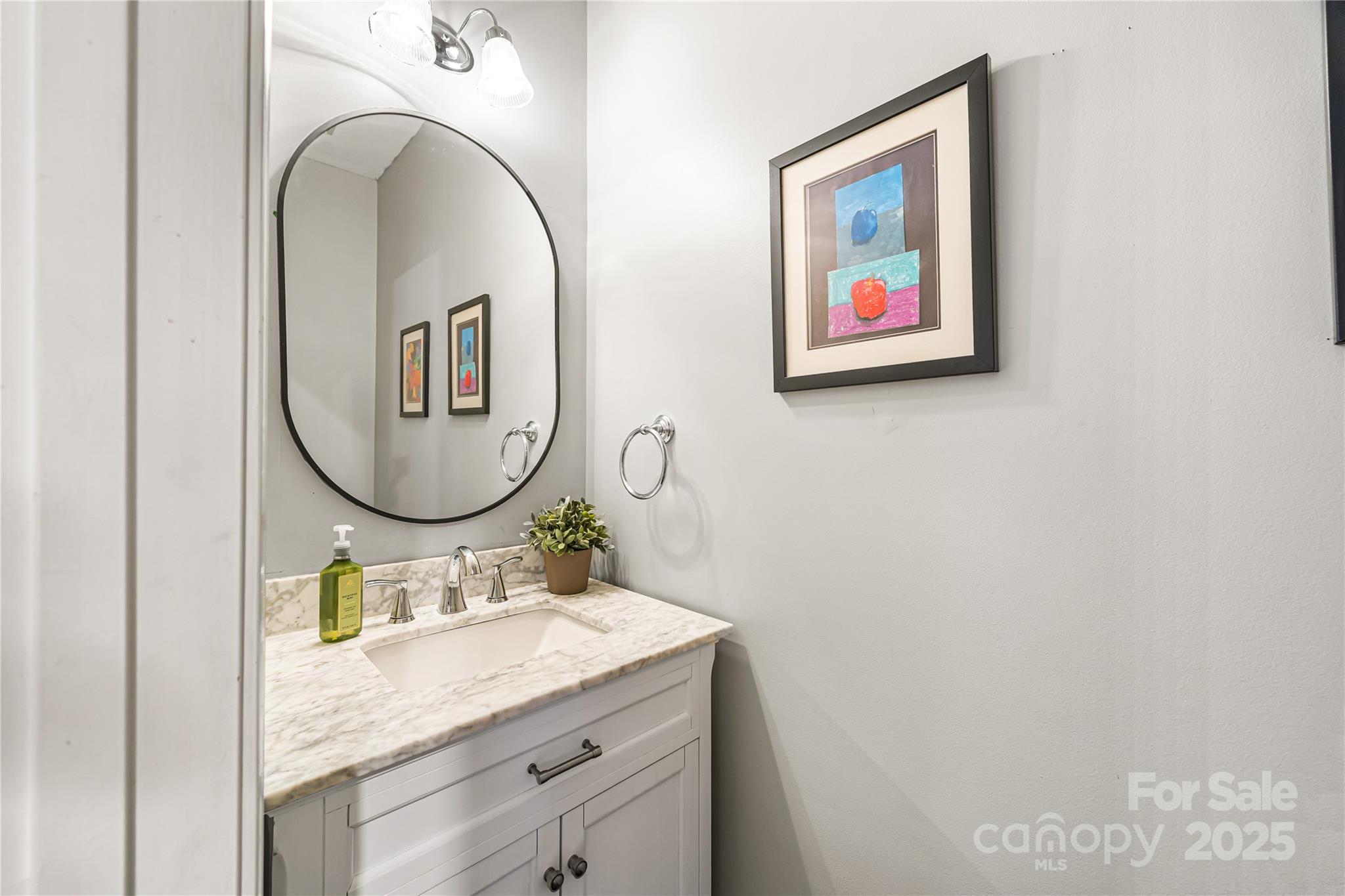 126 Blandina Court Fort Mill, SC 29708 - Photo 5 of 33 a bathroom with a granite countertop sink mirror and vanity