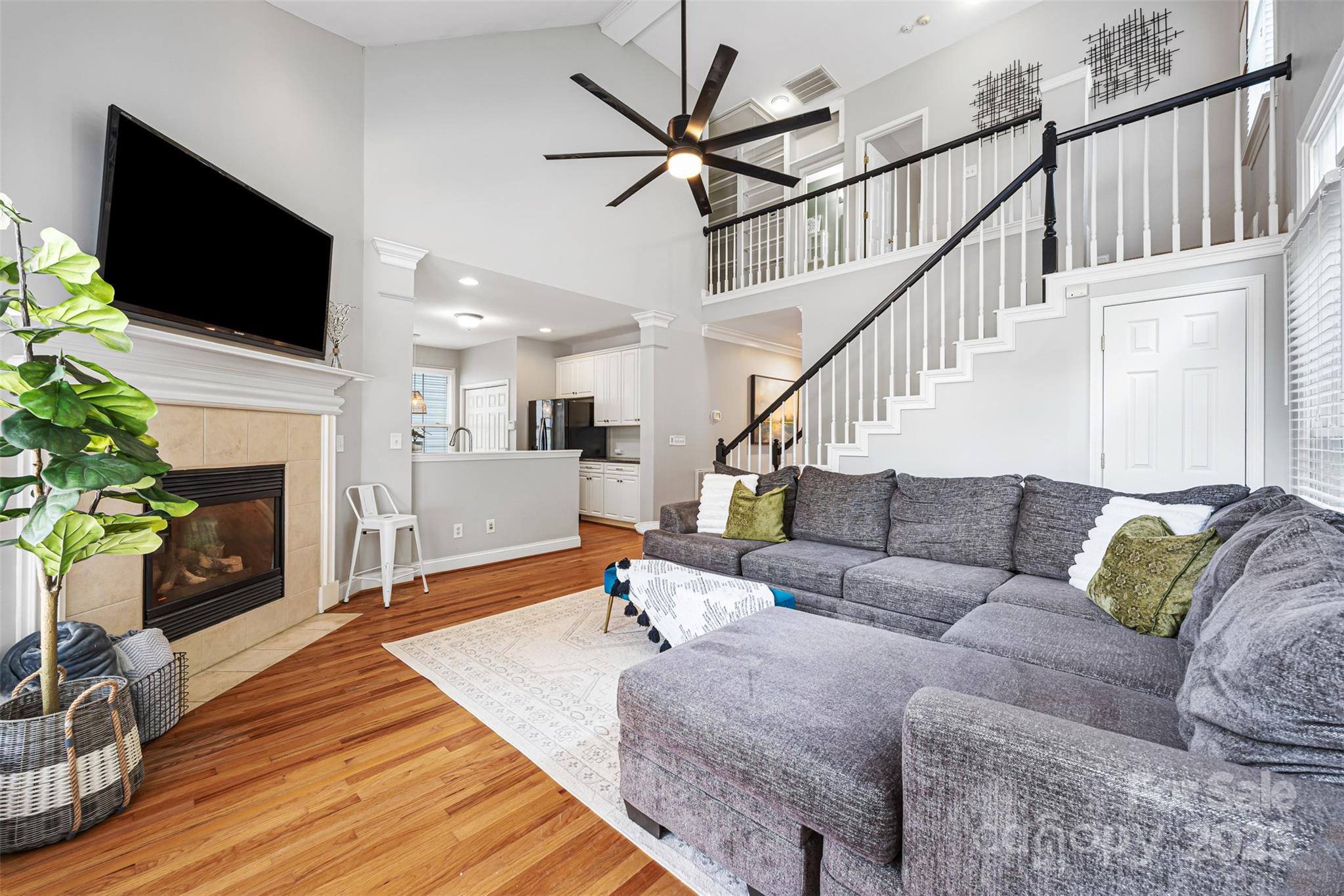 126 Blandina Court Fort Mill, SC 29708 - Photo 8 of 33 a living room with furniture fireplace and a flat screen tv
