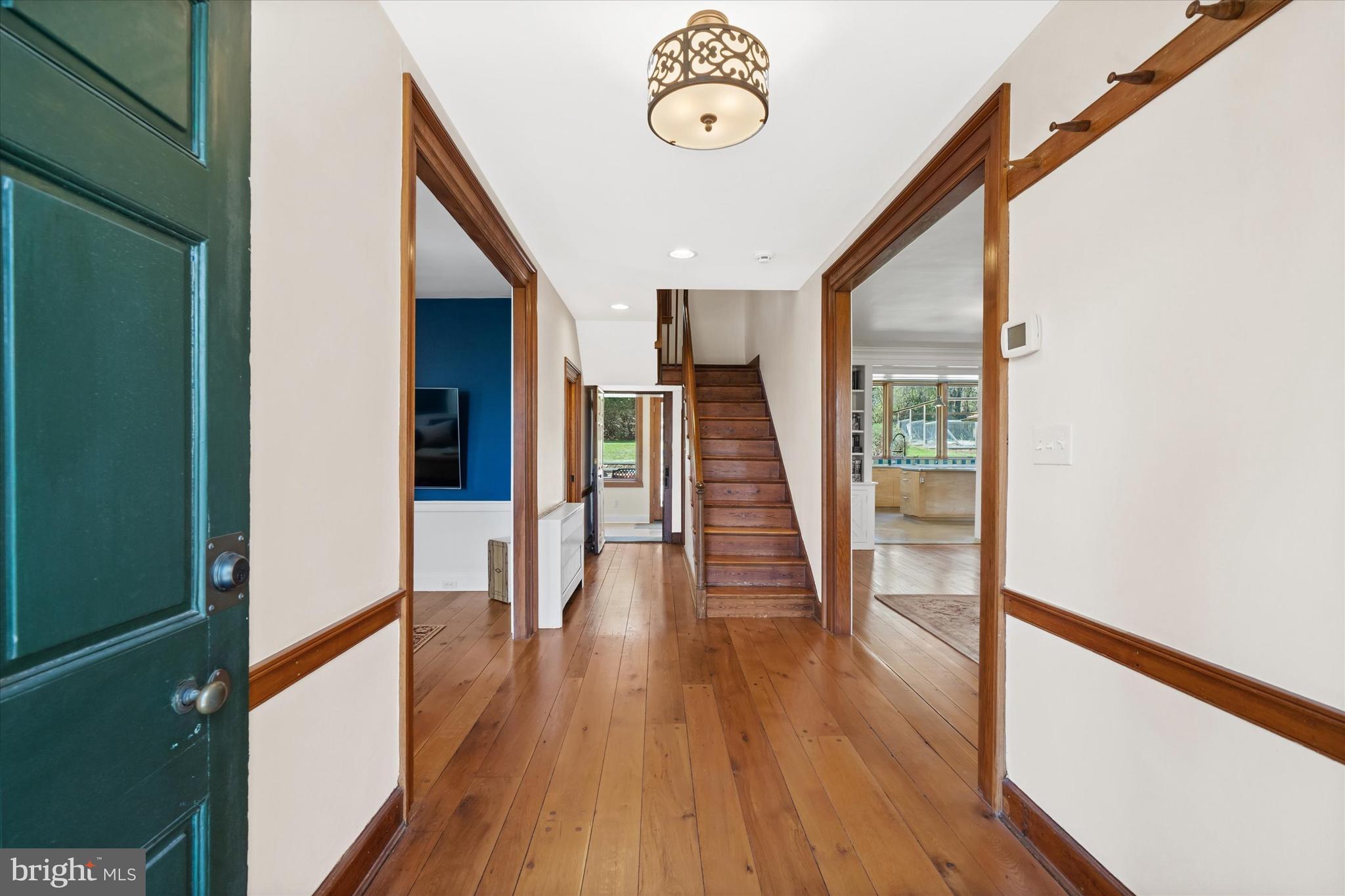 1439 Old Wilmington Road Hockessin, DE 19707 - Photo 11 of 57 a view of a hallway with wooden floor