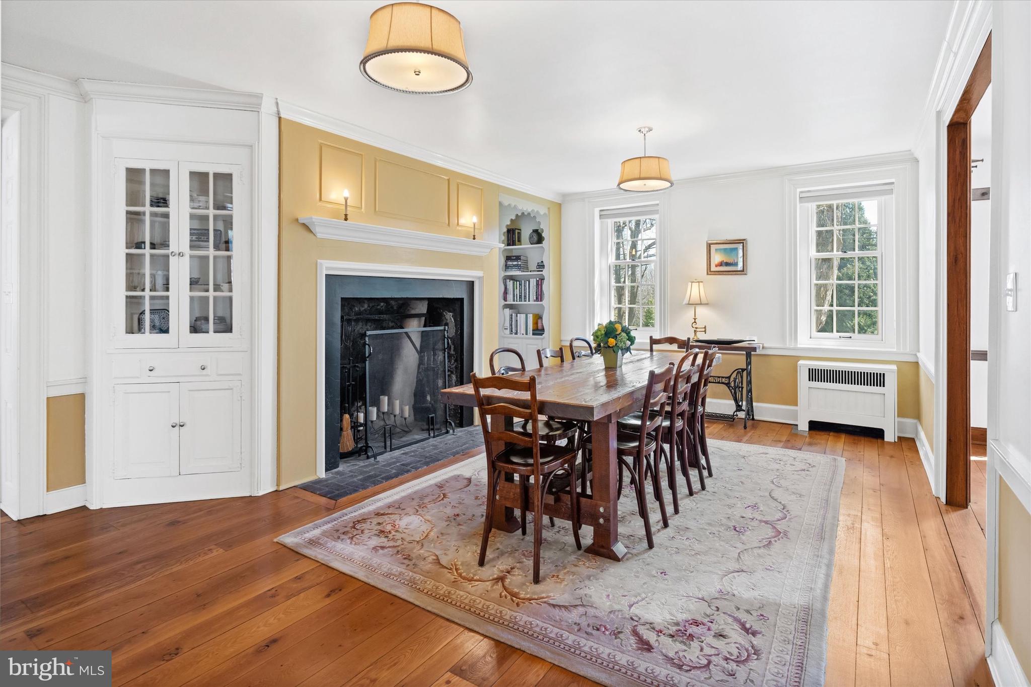 1439 Old Wilmington Road Hockessin, DE 19707 - Photo 14 of 57 a view of a dining room with furniture window and wooden floor