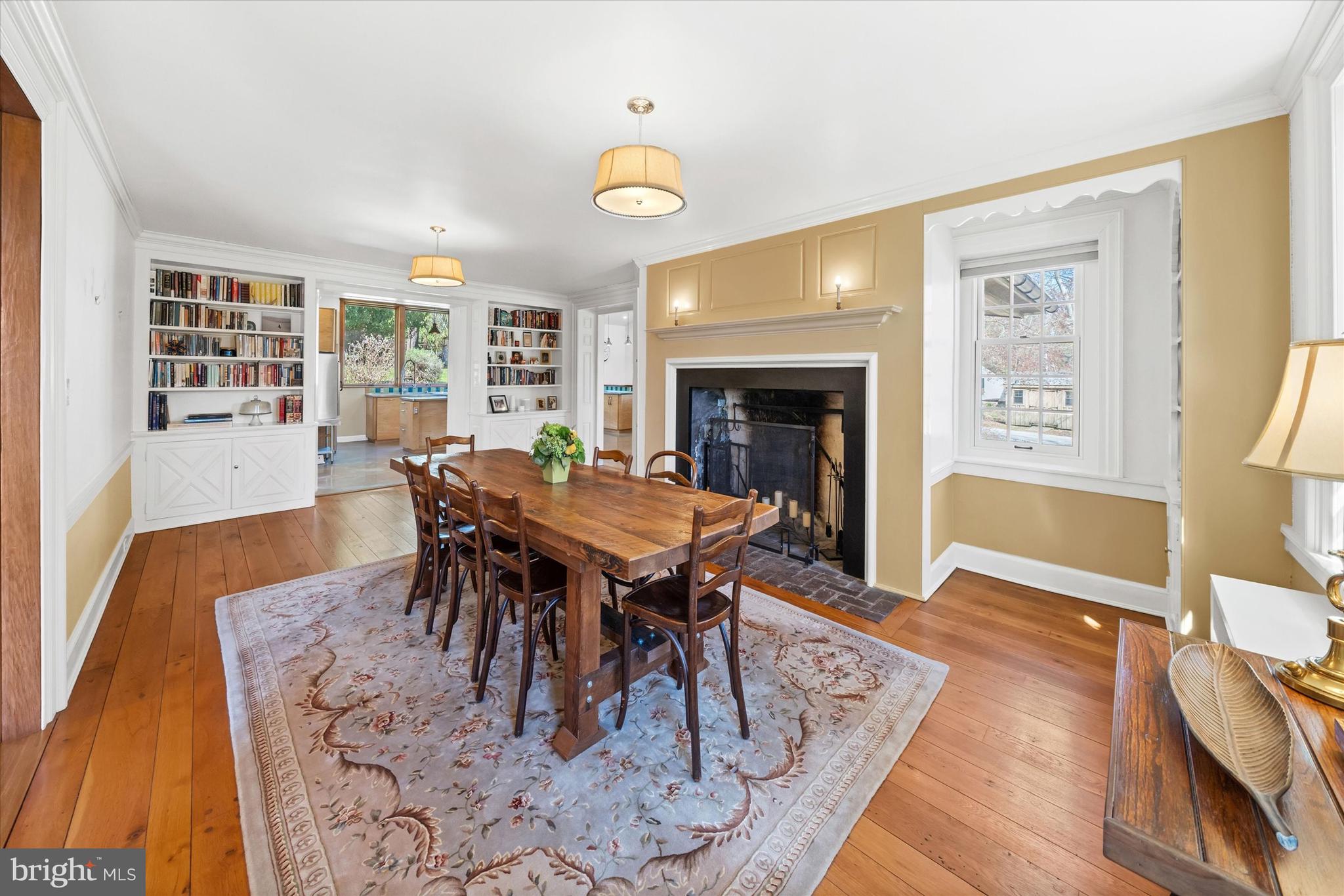 1439 Old Wilmington Road Hockessin, DE 19707 - Photo 15 of 57 a dining room with furniture and wooden floor