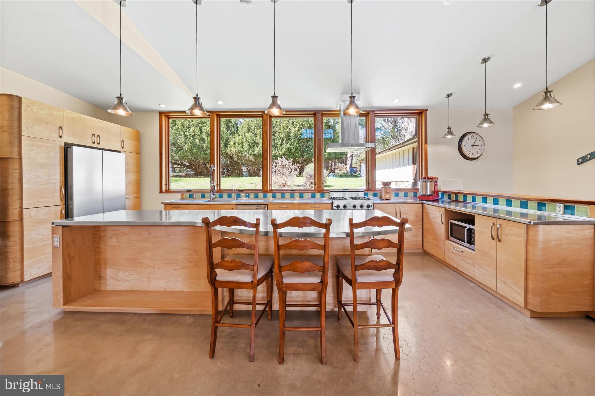 1439 Old Wilmington Road Hockessin, DE 19707 - Photo 16 of 57 a dining room with furniture and window